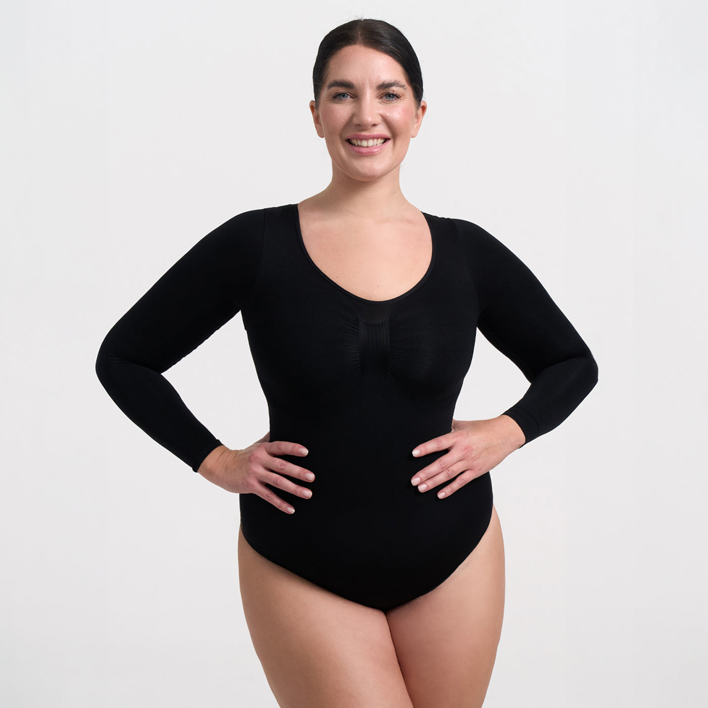 <tc>Body modellante a maniche lunghe con slip</tc>